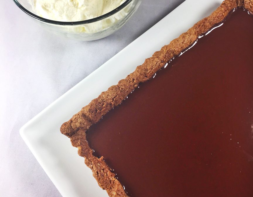 Chocolate Bourbon Tart with Pecan Crust & Fresh Whipped Cream