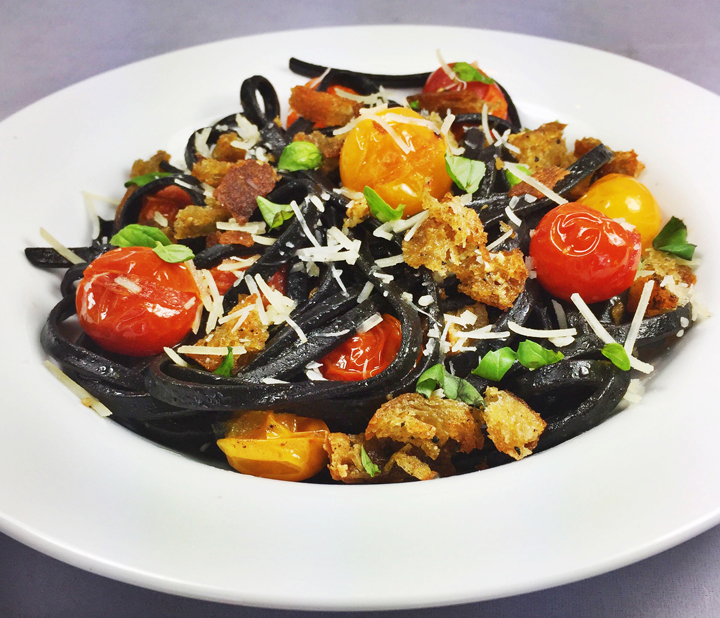 Squid Ink Fettuccine with Pan-Seared Cherry Tomatoes, Parmesan, and Basil