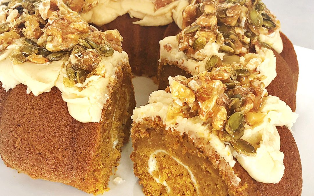 Pumpkin Spice Cake with Brown Butter Maple Icing and Caramelized Walnuts and Pepitos