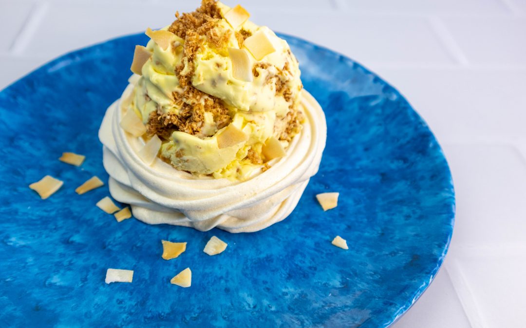 Mango and Passion Fruit Ice Creams with Coconut Clusters in Banana Meringue Shells